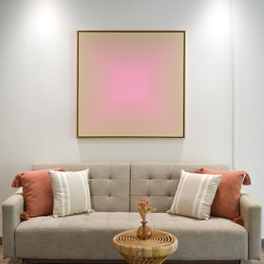 Abstract painting featuring concentric squares transitioning from beige at the edges to a vibrant pink center, with soft gradient blending in between.