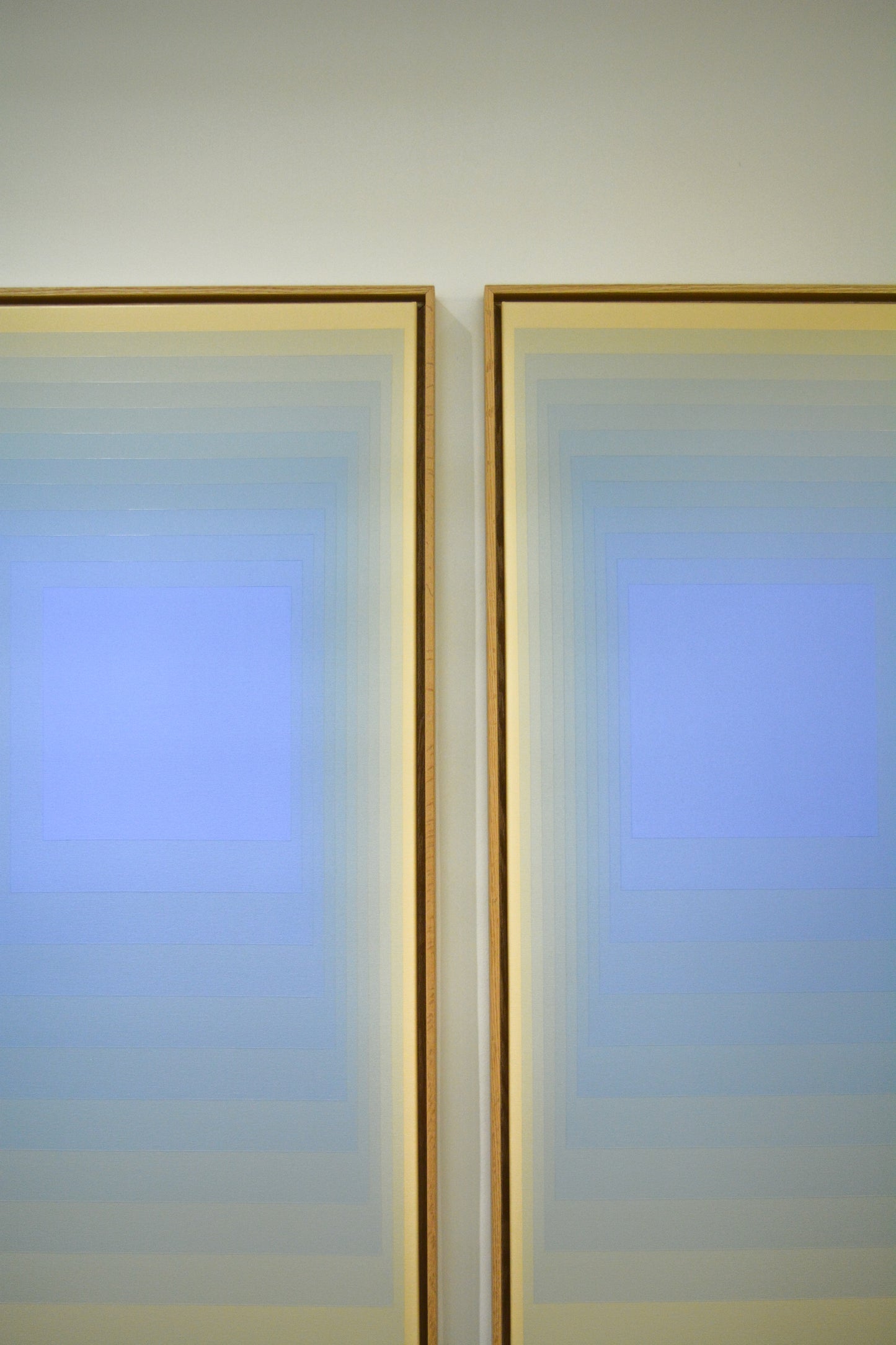 diptych, abstract concentric squares in beige and blue gradient.