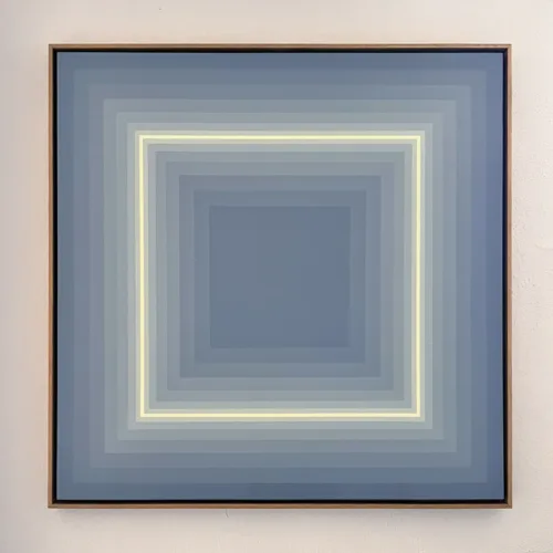 A minimalist, geometric abstract painting titled Pulses, featuring a framed composition of layered grey gradients transitioning into a soft, glowing yellow. The artwork is mounted on a neutral wall, emphasizing its structured yet fluid energy.
